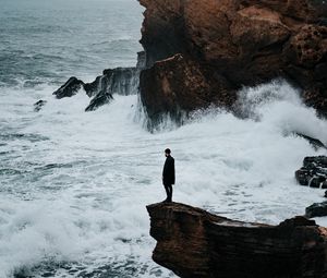 Preview wallpaper man, rock, sea, waves, alone