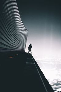 Preview wallpaper man, roof, height, sky