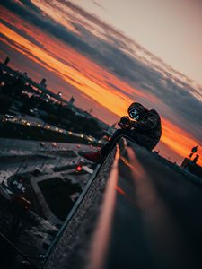 Preview wallpaper man, roof, mask, review, height, photographer