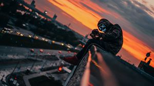 Preview wallpaper man, roof, mask, review, height, photographer
