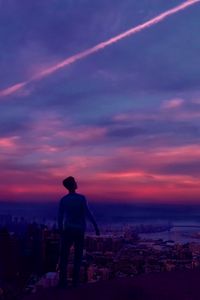 Preview wallpaper man, roof, sunset, view, height, sky, loneliness