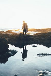 Preview wallpaper man, sea, coast, sunlight, waves