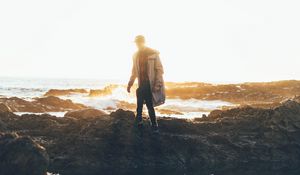 Preview wallpaper man, sea, coast, sunlight, waves