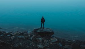 Preview wallpaper man, sea, stones, loneliness, alone