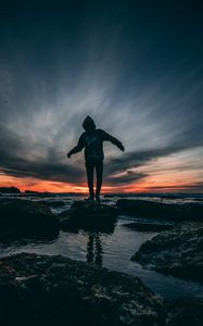 Preview wallpaper man, sea, sunset, stones, loneliness