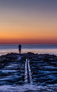 Preview wallpaper man, shore, evening, sea