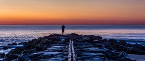 Preview wallpaper man, shore, evening, sea