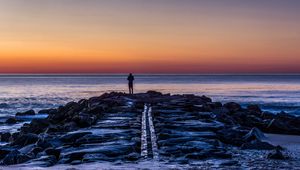 Preview wallpaper man, shore, evening, sea