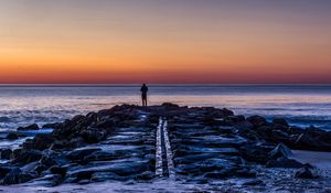 Preview wallpaper man, shore, evening, sea