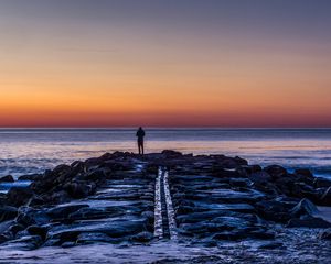 Preview wallpaper man, shore, evening, sea