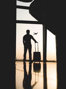 Preview wallpaper man, silhouette, airport, travel, suitcase