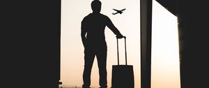 Preview wallpaper man, silhouette, airport, travel, suitcase