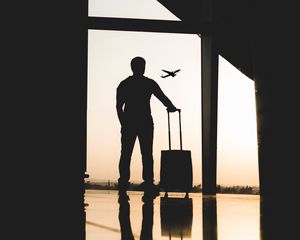 Preview wallpaper man, silhouette, airport, travel, suitcase