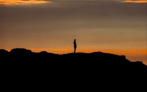 Preview wallpaper man, silhouette, alone, loneliness, dark