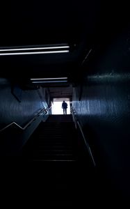 Preview wallpaper man, silhouette, alone, stairs, climb, dark