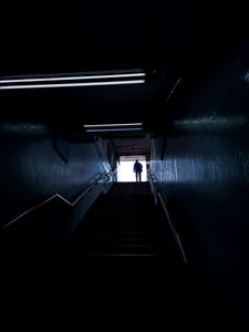 Preview wallpaper man, silhouette, alone, stairs, climb, dark