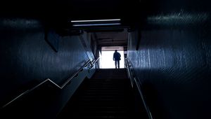 Preview wallpaper man, silhouette, alone, stairs, climb, dark