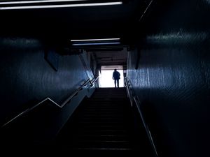 Preview wallpaper man, silhouette, alone, stairs, climb, dark