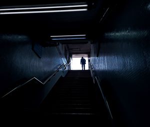 Preview wallpaper man, silhouette, alone, stairs, climb, dark