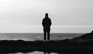 Preview wallpaper man, silhouette, alone, water, black and white, bw