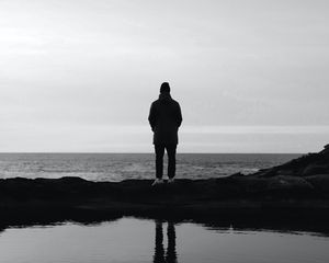 Preview wallpaper man, silhouette, alone, water, black and white, bw