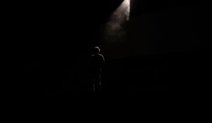 Preview wallpaper man, silhouette, alone, light, ray, dark, black