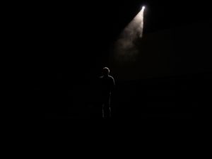 Preview wallpaper man, silhouette, alone, light, ray, dark, black
