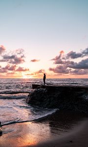 Preview wallpaper man, silhouette, alone, rock, sea, sunset