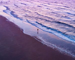 Preview wallpaper man, silhouette, alone, beach, sea, aerial view, purple