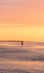Preview wallpaper man, silhouette, alone, beach, sea, sunset