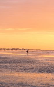 Preview wallpaper man, silhouette, alone, beach, sea, sunset