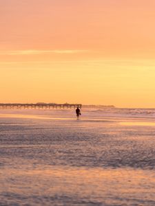 Preview wallpaper man, silhouette, alone, beach, sea, sunset