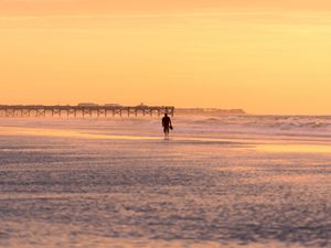 Preview wallpaper man, silhouette, alone, beach, sea, sunset