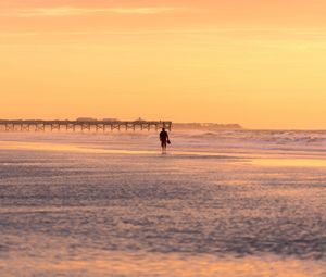 Preview wallpaper man, silhouette, alone, beach, sea, sunset