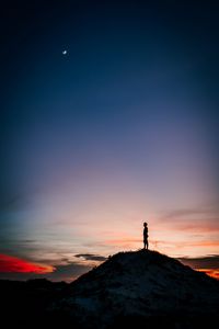 Preview wallpaper man, silhouette, alone, mountain, peak, dusk