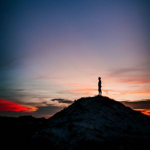 Preview wallpaper man, silhouette, alone, mountain, peak, dusk