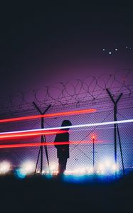 Preview wallpaper man, silhouette, barbed wire, fence