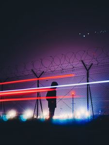 Preview wallpaper man, silhouette, barbed wire, fence