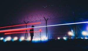 Preview wallpaper man, silhouette, barbed wire, fence