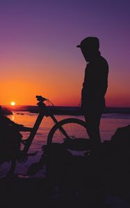 Preview wallpaper man, silhouette, bicycle, sunset