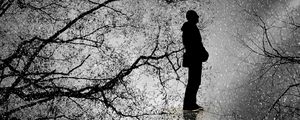 Preview wallpaper man, silhouette, branches, rain, bw