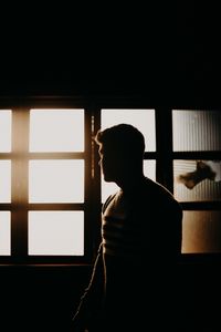 Preview wallpaper man, silhouette, dark, window, light