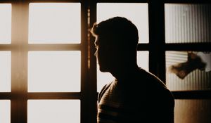 Preview wallpaper man, silhouette, dark, window, light