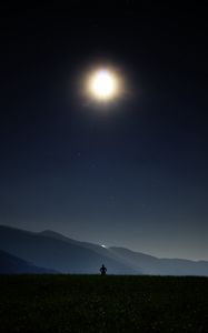 Preview wallpaper man, silhouette, field, night, sky, stars