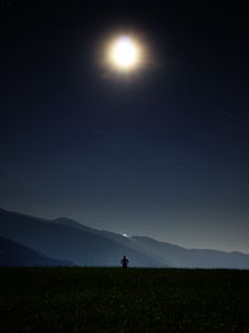 Preview wallpaper man, silhouette, field, night, sky, stars