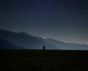 Preview wallpaper man, silhouette, field, night, sky, stars