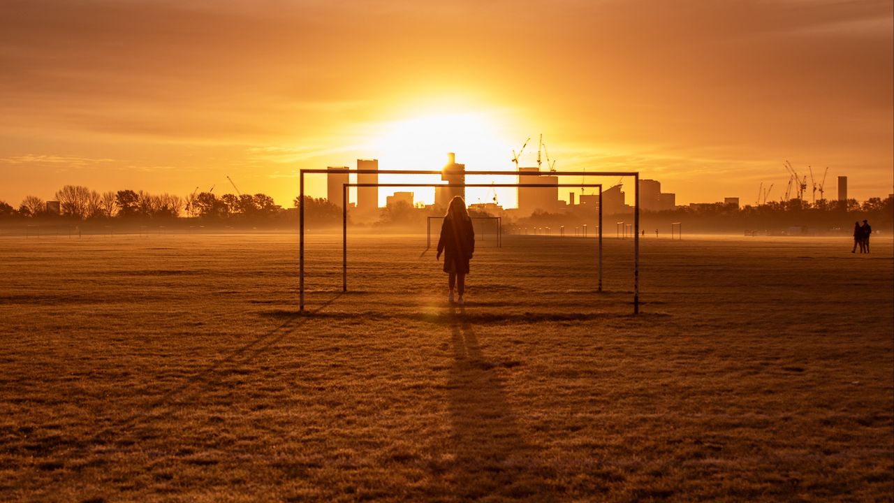 Wallpaper man, silhouette, gate, buildings, sunset
