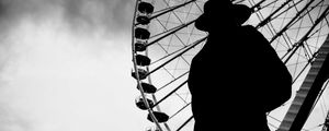 Preview wallpaper man, silhouette, hat, ferris wheel, alone, black and white