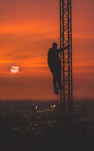 Preview wallpaper man, silhouette, height, sky