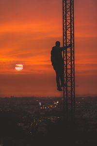 Preview wallpaper man, silhouette, height, sky